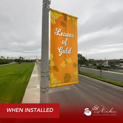 Leaves of Gold fall pole banner installed along city street for seasonal autumn décor