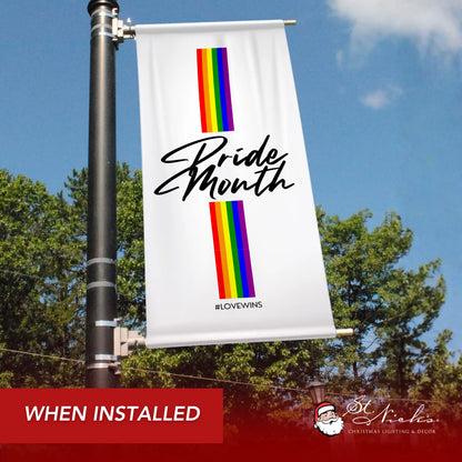 Love Is Love Pride Month pole banner displayed on street pole in real installation