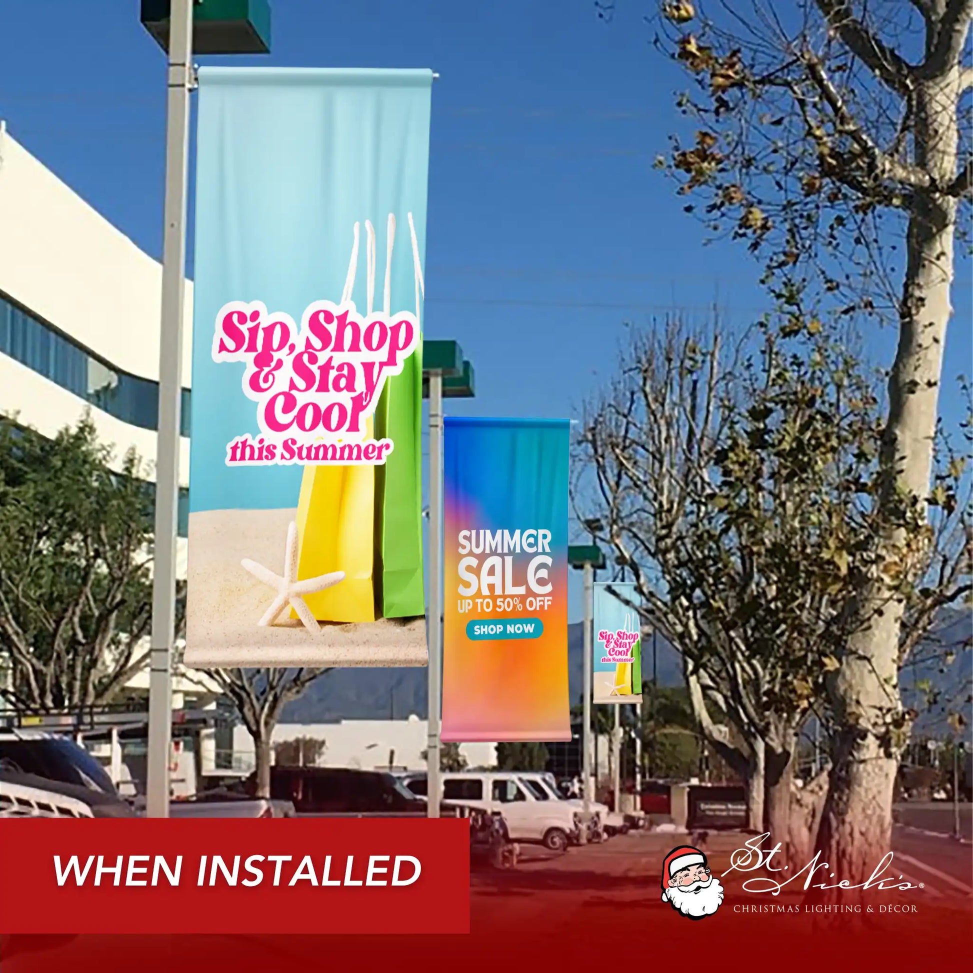 Sip Shop Stay Cool light blue street banner displayed along shopping district walkway