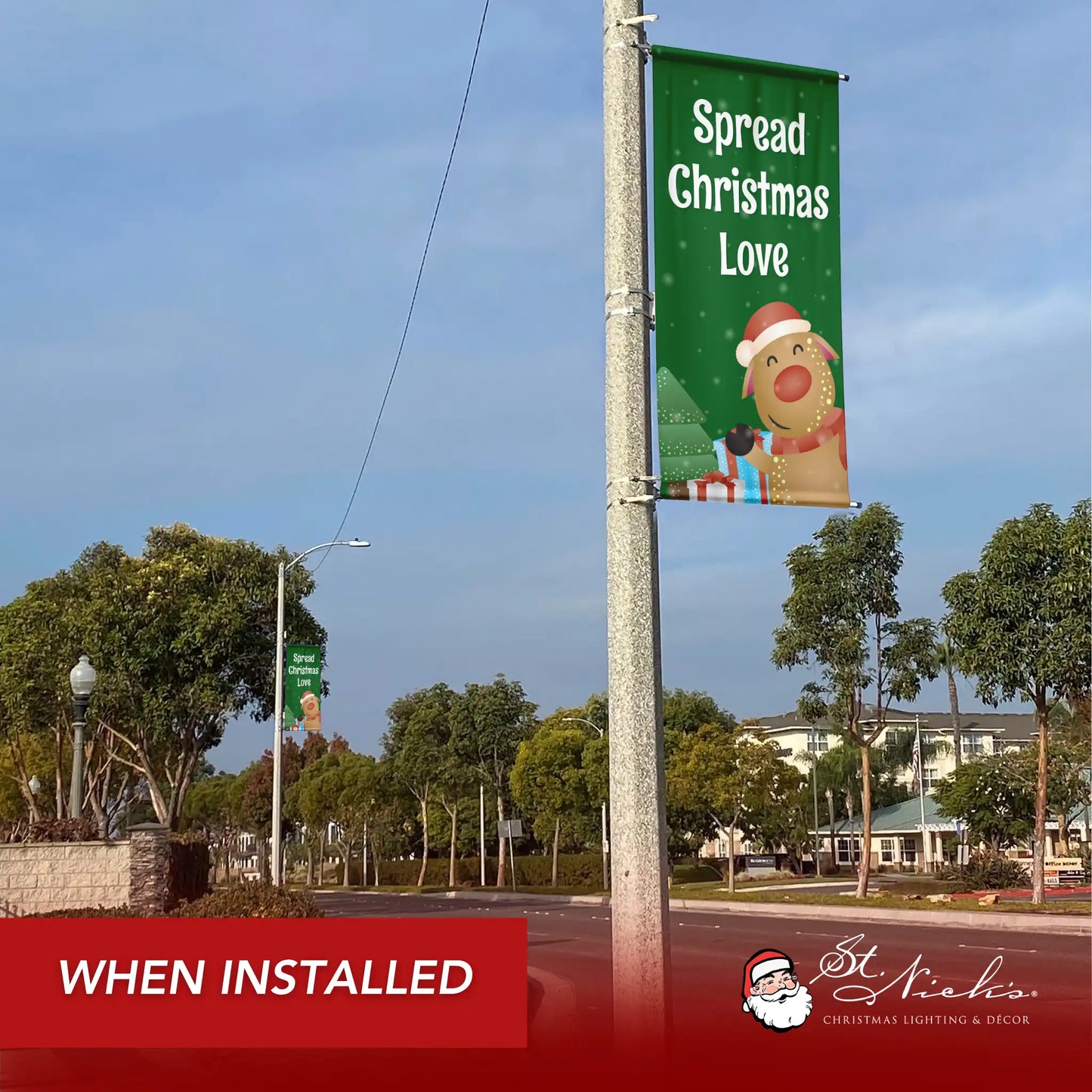 Spread Christmas Love Christmas pole banner installed along city street for festive holiday décor