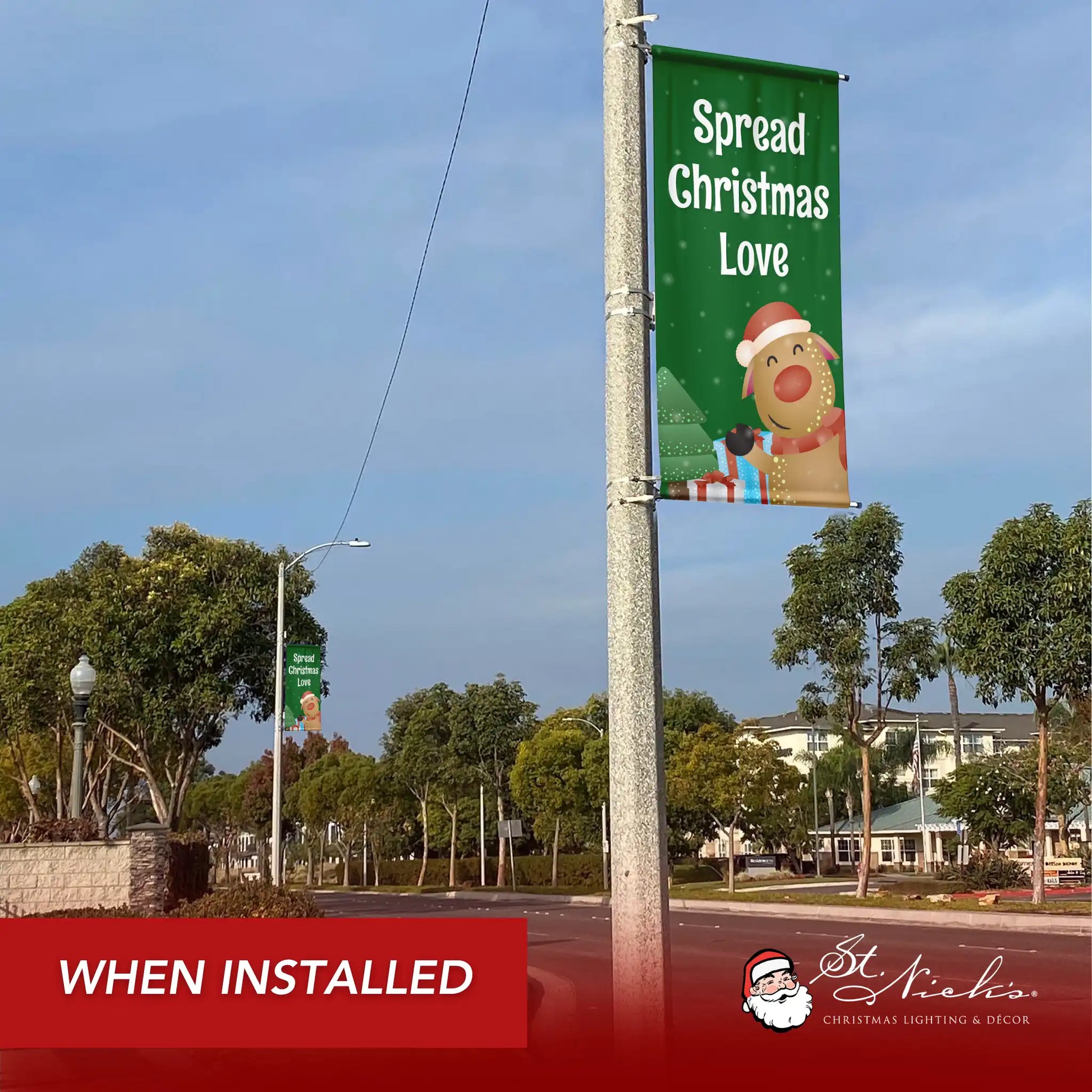 Spread Christmas Love Christmas pole banner installed along city street for festive holiday décor