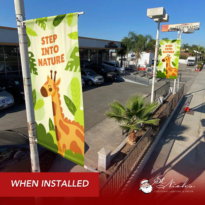 Step Into Nature green street banner displayed along sidewalk in commercial outdoor setting