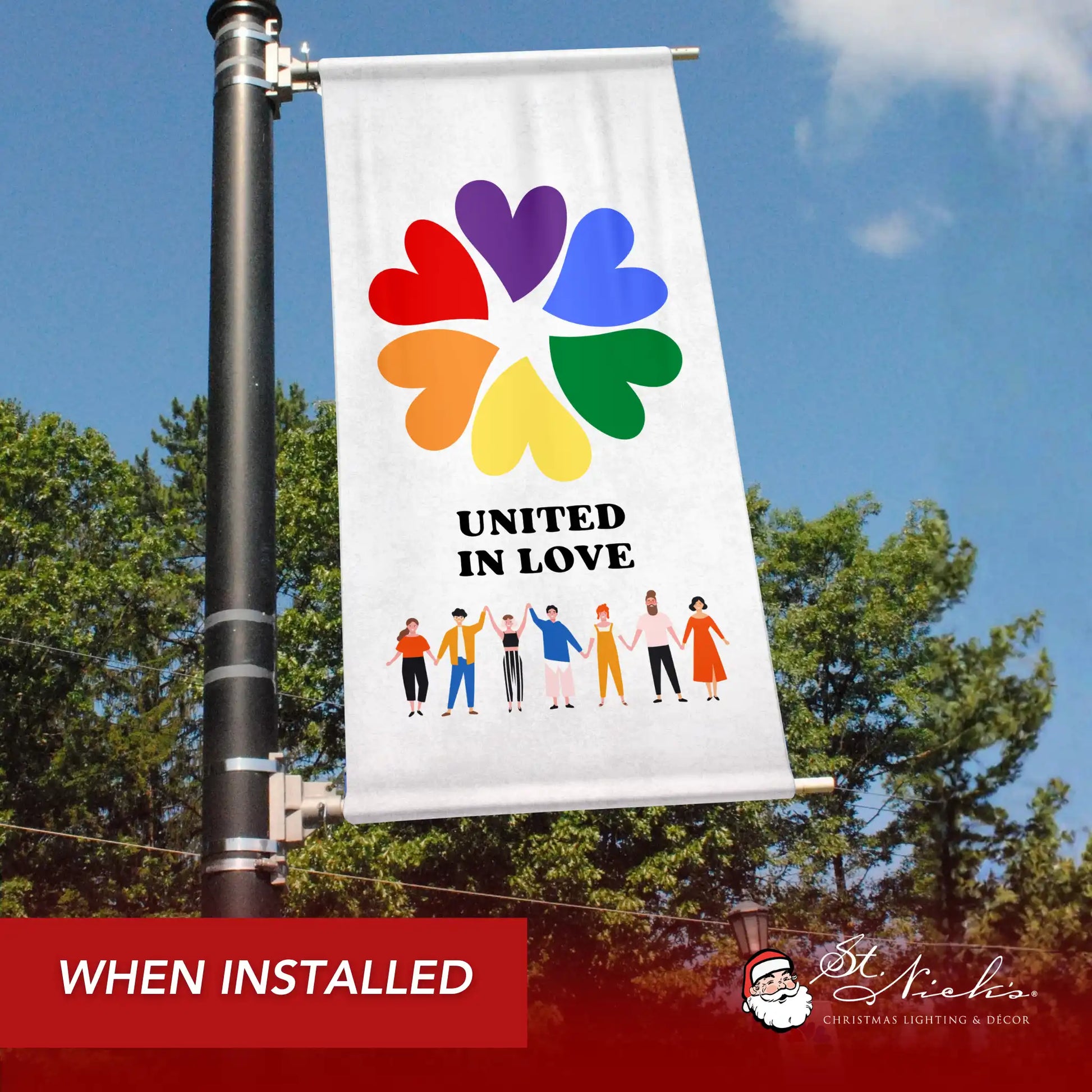 United in Love pride pole banner displayed on city street pole celebrating inclusion and community