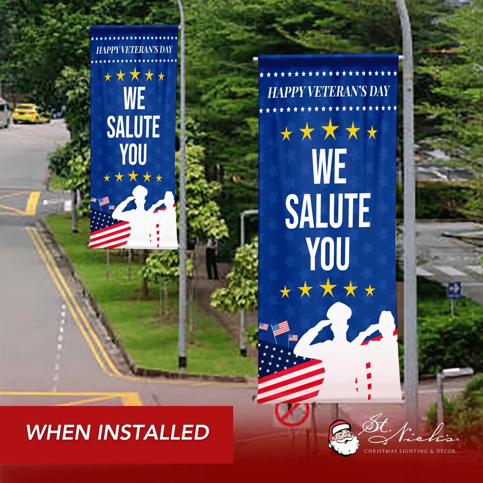 We Salute You blue Veterans Day street pole banner displayed along roadway