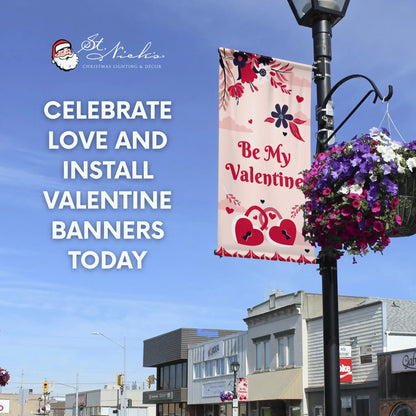 Be My Valentine pink pole banner displayed downtown celebrating Valentine’s Day