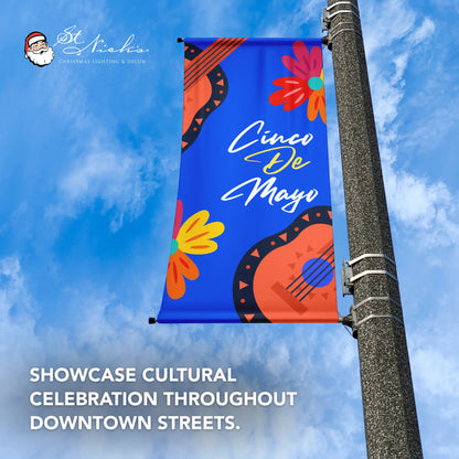 Cinco de Mayo blue guitar floral pole banner promoting festive cultural street décor