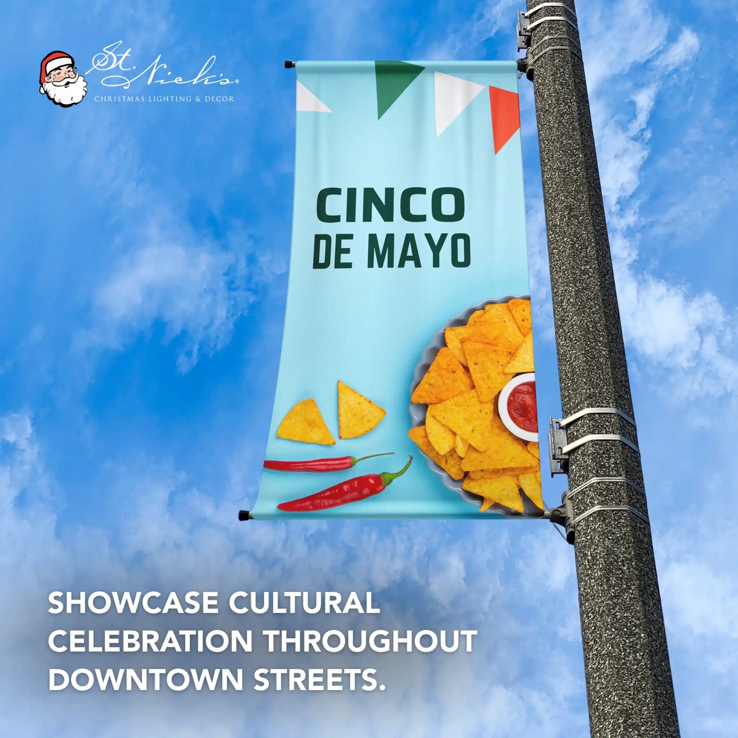 Cinco de Mayo pole banner showcasing cultural celebration along downtown streets with festive food-themed design