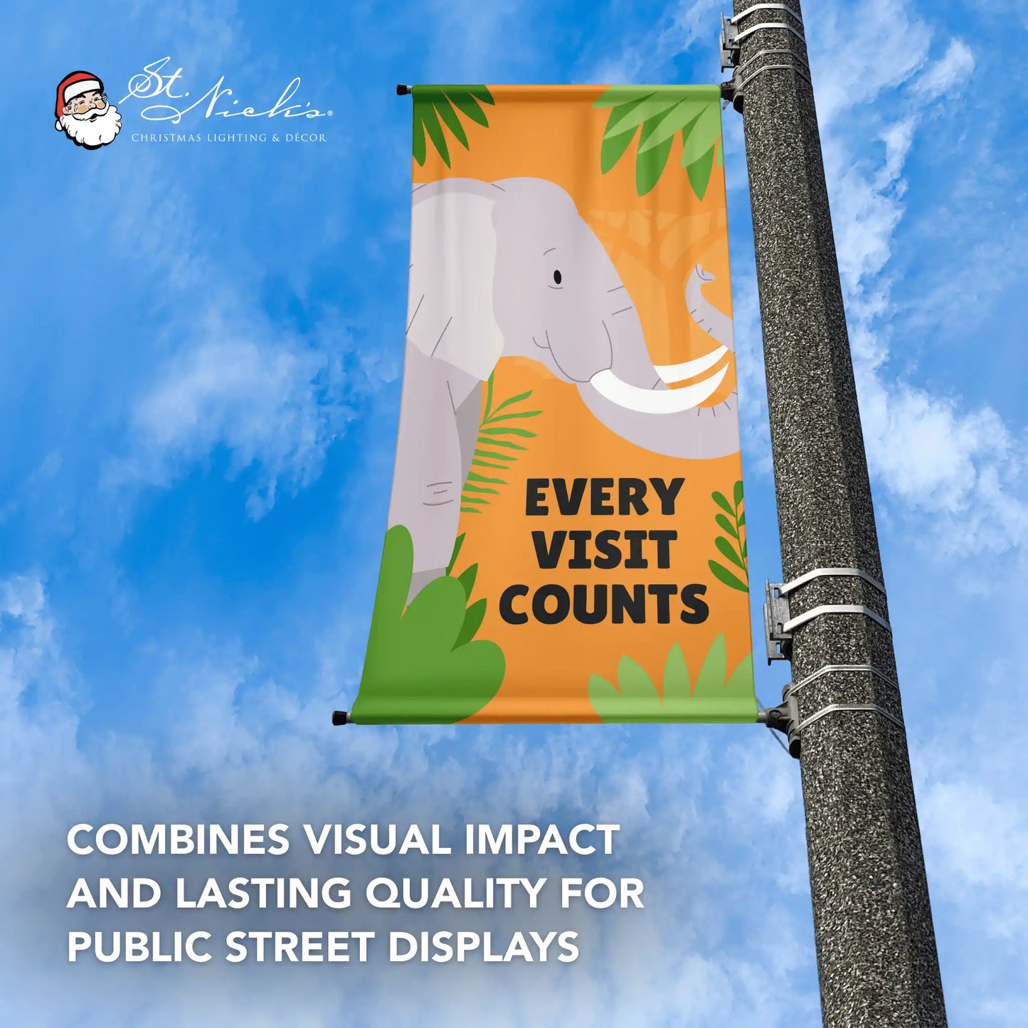 Every Visit Counts elephant pole banner mounted outdoors against blue sky