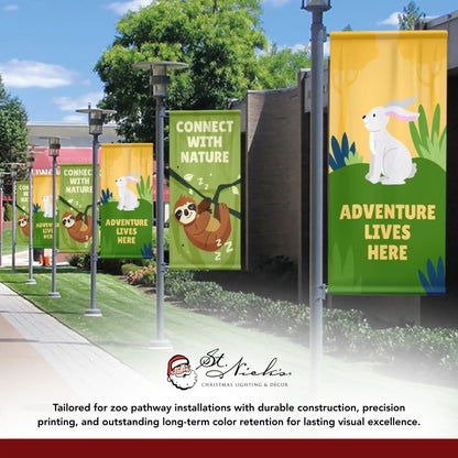 Adventure Lives Here yellow zoo pathway banners featuring rabbit design and adventure theme