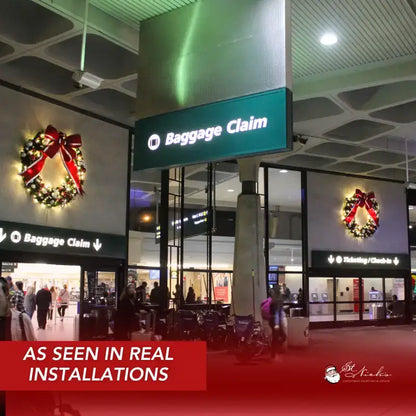 Baggage claim area with Christmas wreaths airport 