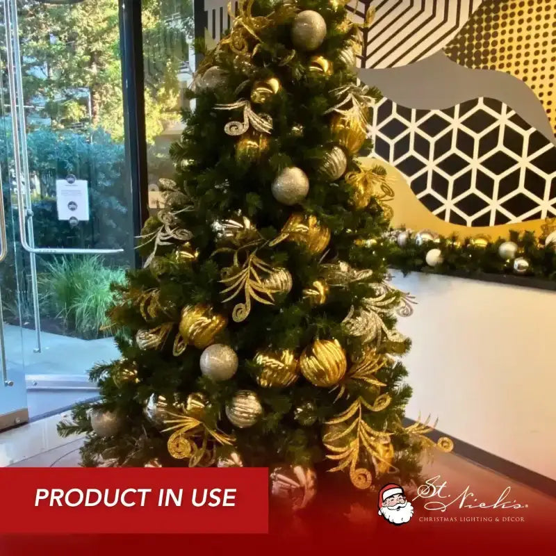 Decorated Christmas tree with gold and silver ornaments