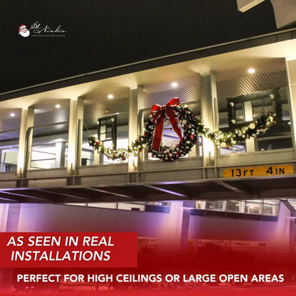 Building exterior with Christmas wreaths and garland decorations