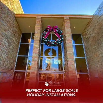 Christmas wreath with a large bow hanging on a building entrance, Perfect for large-scale holiday decor