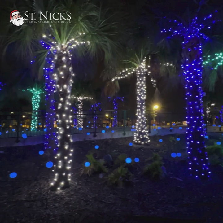 Product video featuring aqua, blue, and cool white twinkle LED mini lights glowing across a green-wire commercial light strand.