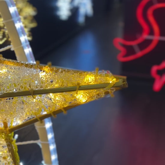 gold-5-point-christmas-lighting-and-decor-star-w-ww-twinkle-light-st-nicks-CA