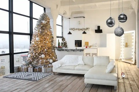 Modern living room with a Christmas tree and festive decorations.